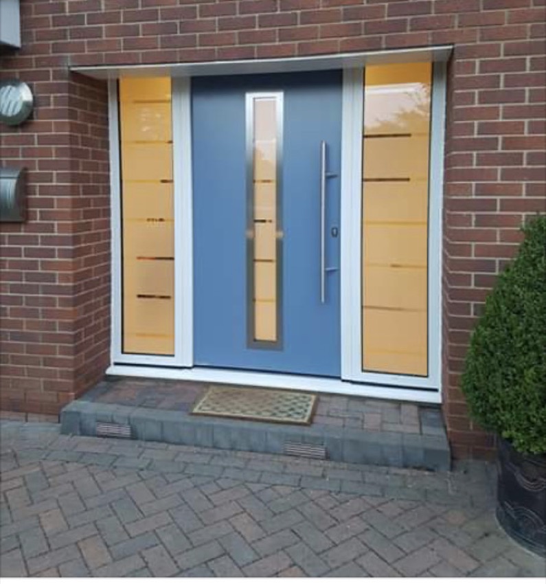 New front door with side full length glass panels